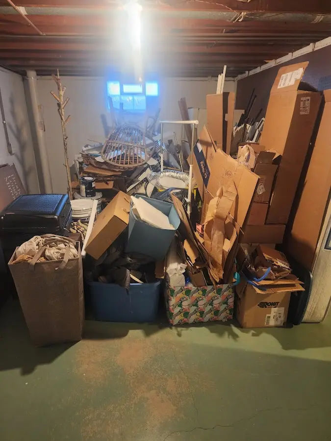 Roll-off dumpster container at job site for 4 Yard Dumpster Rental in Newark